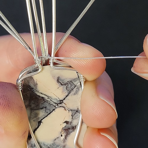 Jennifer Brooks's Snowy Road Pendant - Wrapping the Bail., Classic Wire Jewelry, Wire Wrapping, Wrapping, Wire Wrapping Jewelry, Weaving, Wire Weaving, Weaving Wire, Continue figure 8 weaving in this pattern for about 1 inch